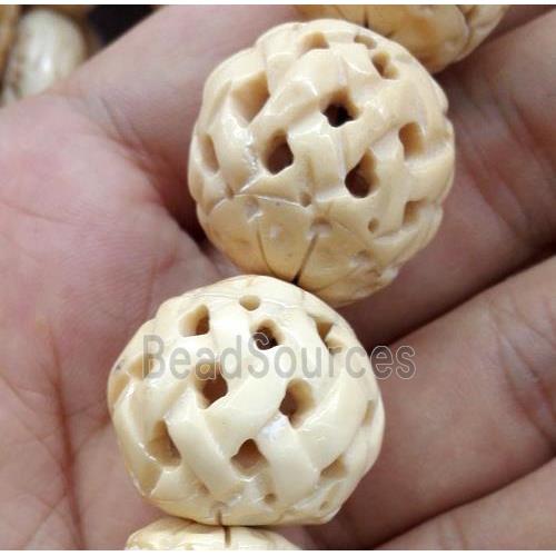 round antique cattle bone bead, yellow