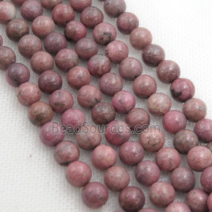Rhodonite beads, round, AA grade