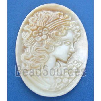 Mother of Pearl cabochon, oval, carved beauty, white