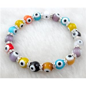 lampwork glass bracelet, stretchy, evil eye, 8mm dia, 7 inch length