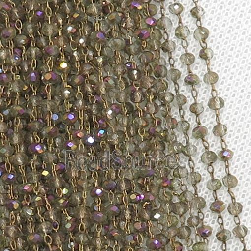 raw brass chain with smoky rainbow crystal glass