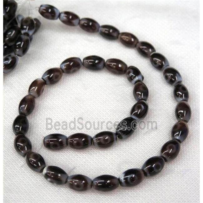 black Tibetan Agate barrel beads with evil eye