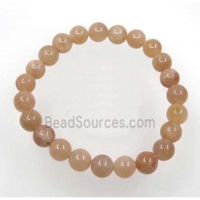 orange SunStone bead bracelet, round, stretchy