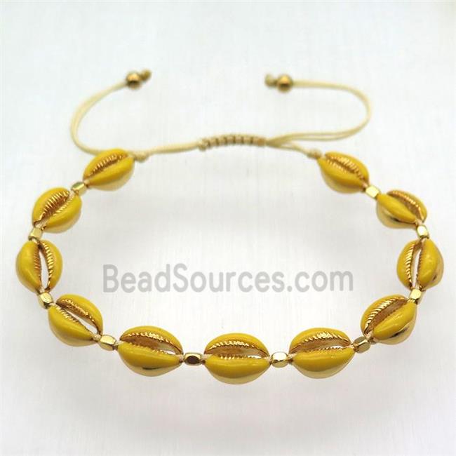 handmade bracelet with coper conch beads, yellow