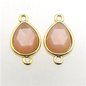 peach SunStone teardrop connector, approx 10-12mm