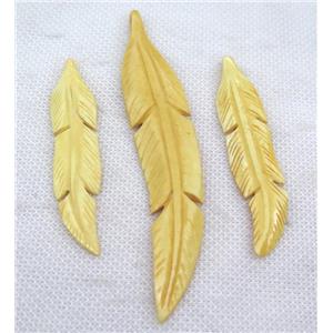 yellow bone feather pendant, approx 13-72mm