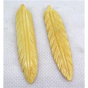 yellow bone feather pendant, approx 15-75mm