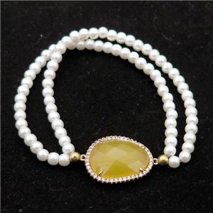 white pearlized glass bracelet, stretchy, approx 4mm