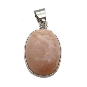 peach Sunstone oval pendant, platinum plated, approx 13-18mm