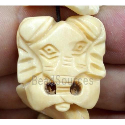 yellow antique cattle bone beads, elephant