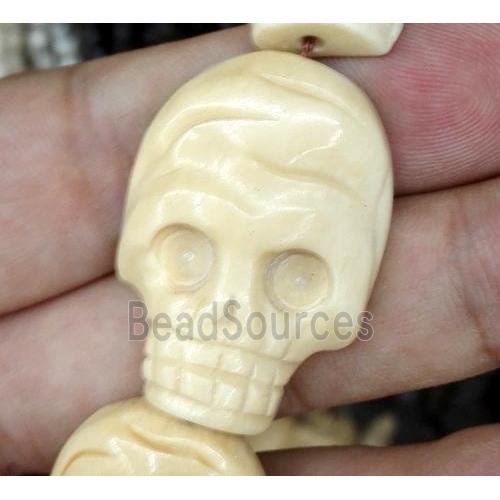 yellow antique cattle bone beads, skull