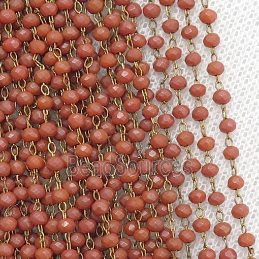 raw brass chain with matte red crystal glass