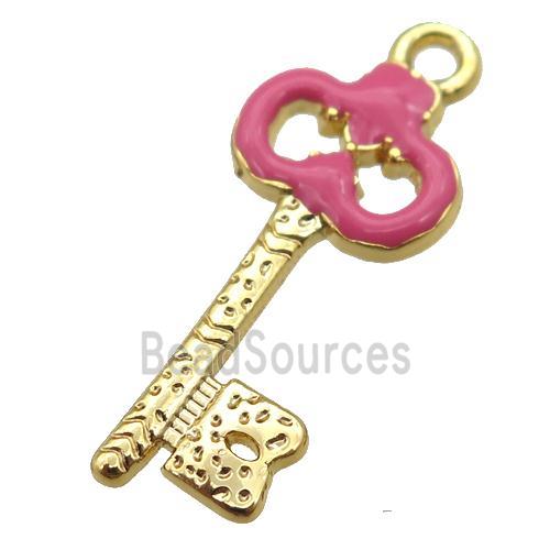 copper Key pendant with hotpink enamel, gold plated