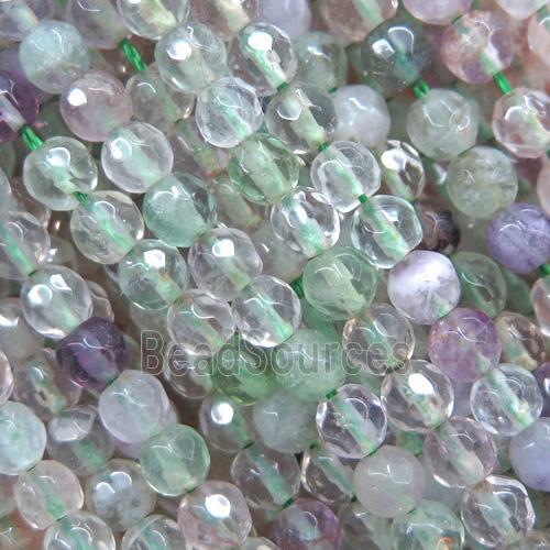 tiny green Fluorite bead, faceted round