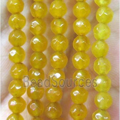 Tiny golden agate bead, faceted round