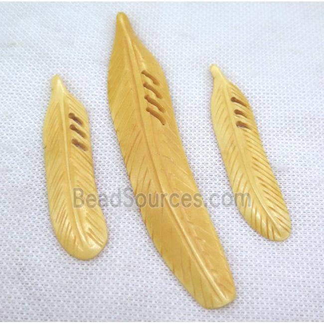 yellow bone feather pendant