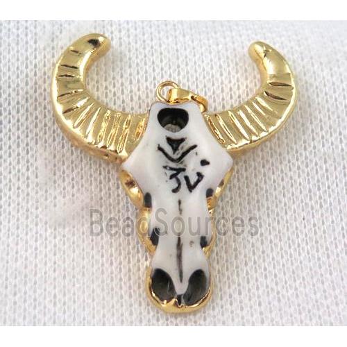 white resin pendant, cattle head, gold plated