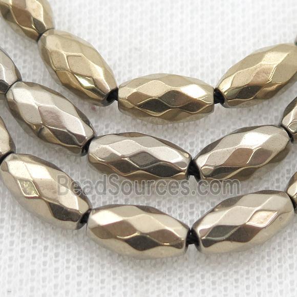 Hematite beads, faceted rice, pyrite color electroplated