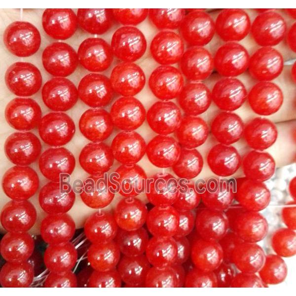 red jade bead, round, stabile