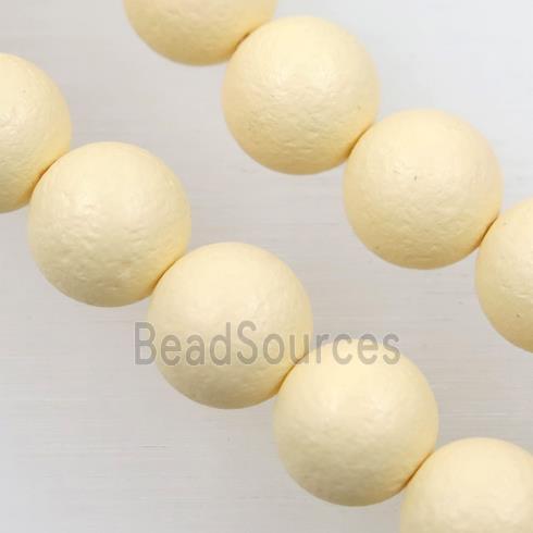 round matte yellow pearlized shell beads