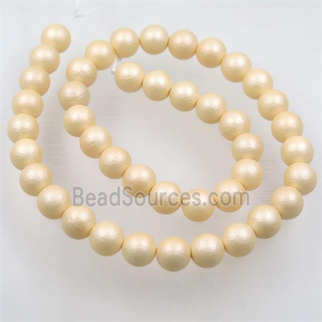 round matte yellow pearlized shell beads