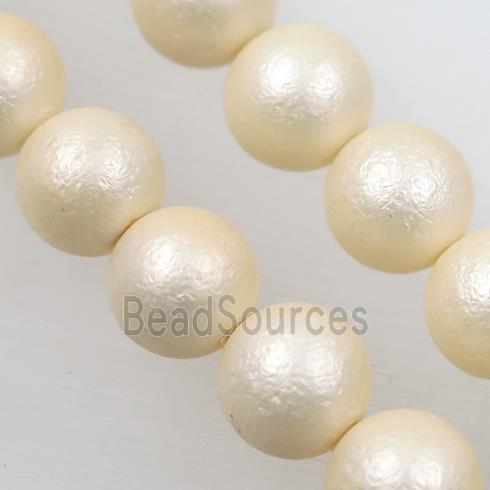 round matte lt.yellow pearlized shell beads