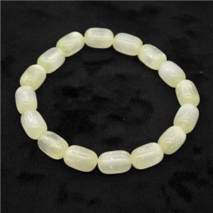 Lt.yellow Selenite Bracelet Stretchy Barrel, approx 8x12mm