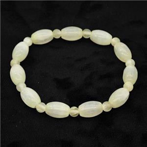 Lt.yellow Selenite Bracelet Stretchy Rice, approx 8x12mm