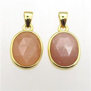 peach SunStone oval pendant, approx 9-11mm